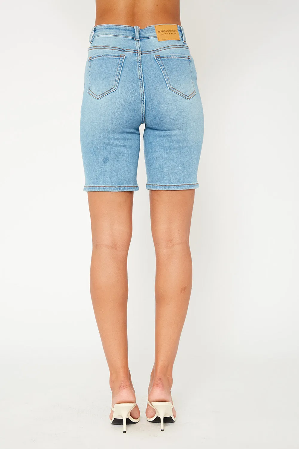High-rise light blue denim bermuda shorts