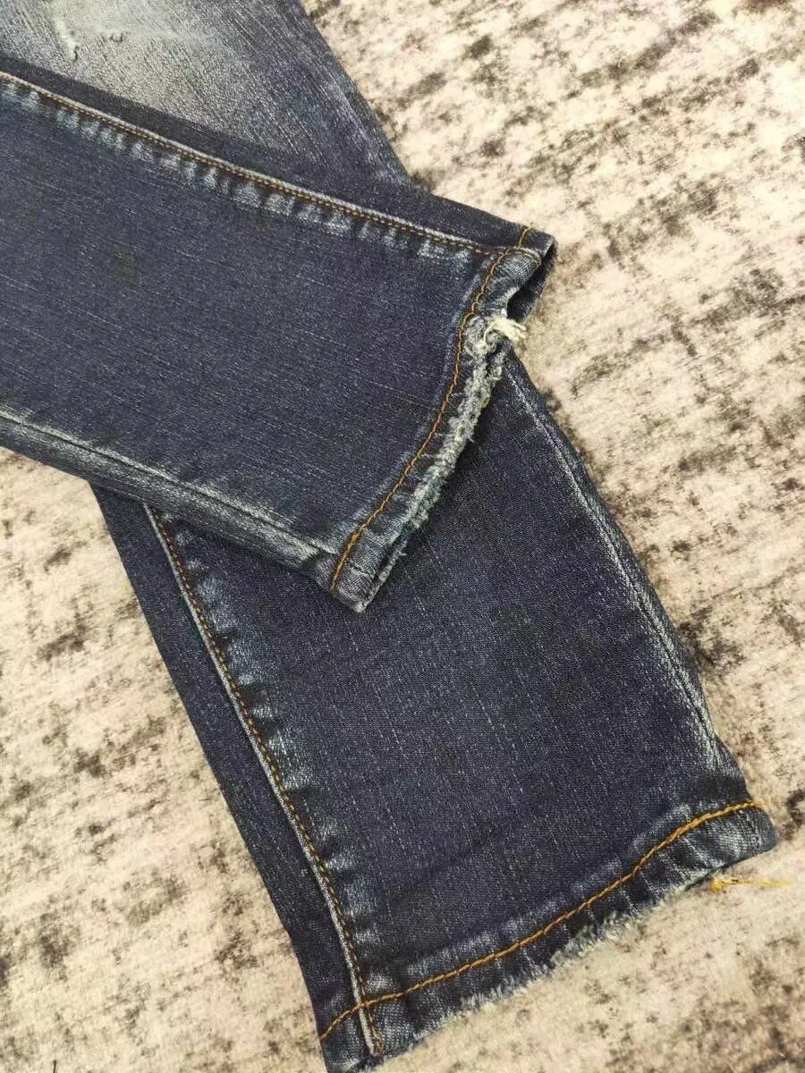 men leather patch distressed indigo jeans